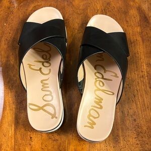 Sam Edelman black leather cross sandal with tan footbed. Size 9M.